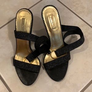 3” heels wrapped around ankle strap black shoes.